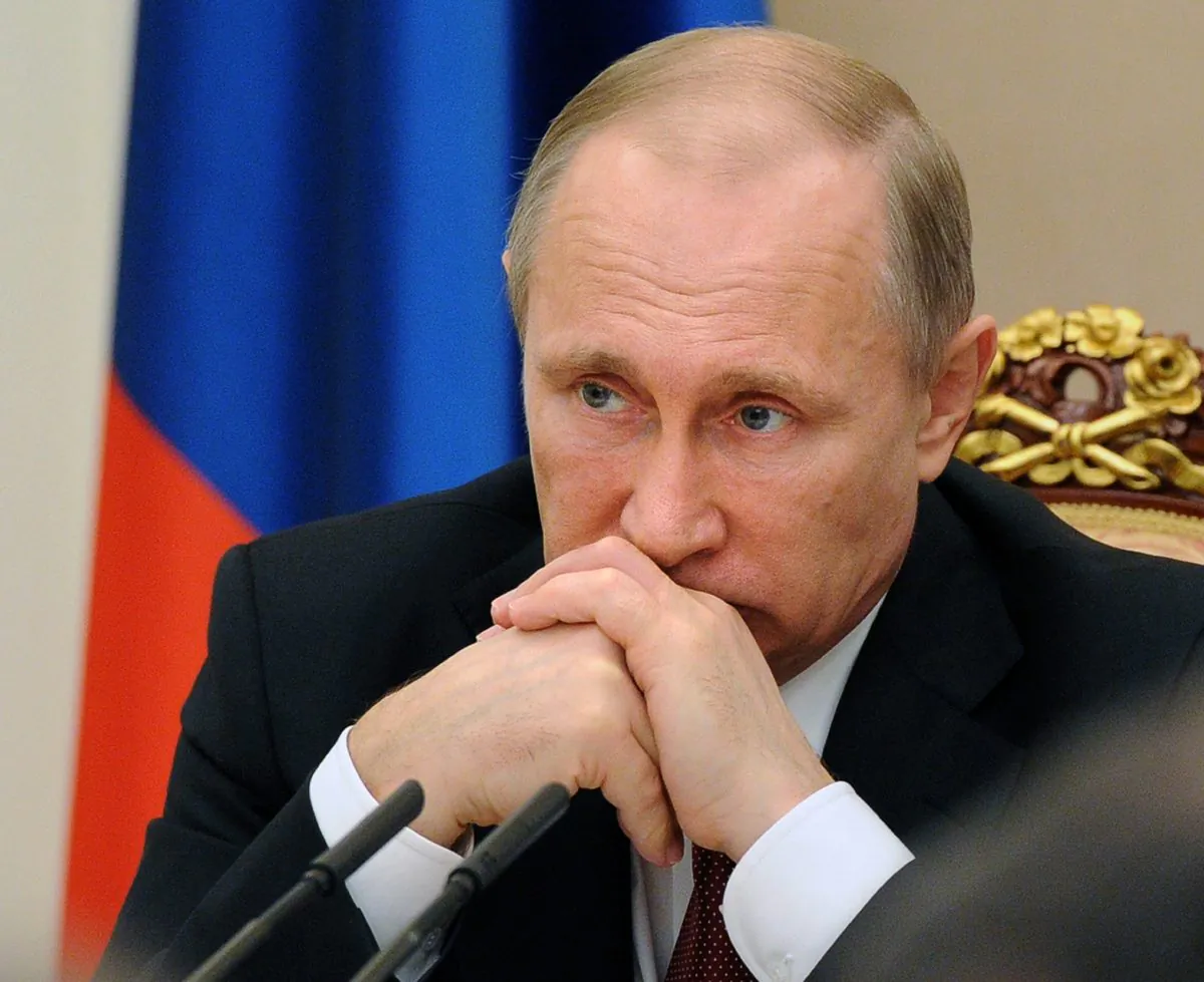 Russian President Vladimir Putin chairs a meeting with government officials in the Kremlin, in Moscow, Russia, on March 25, 2015. (Mikhail Klimentyev/RIA-Novosti via AP)