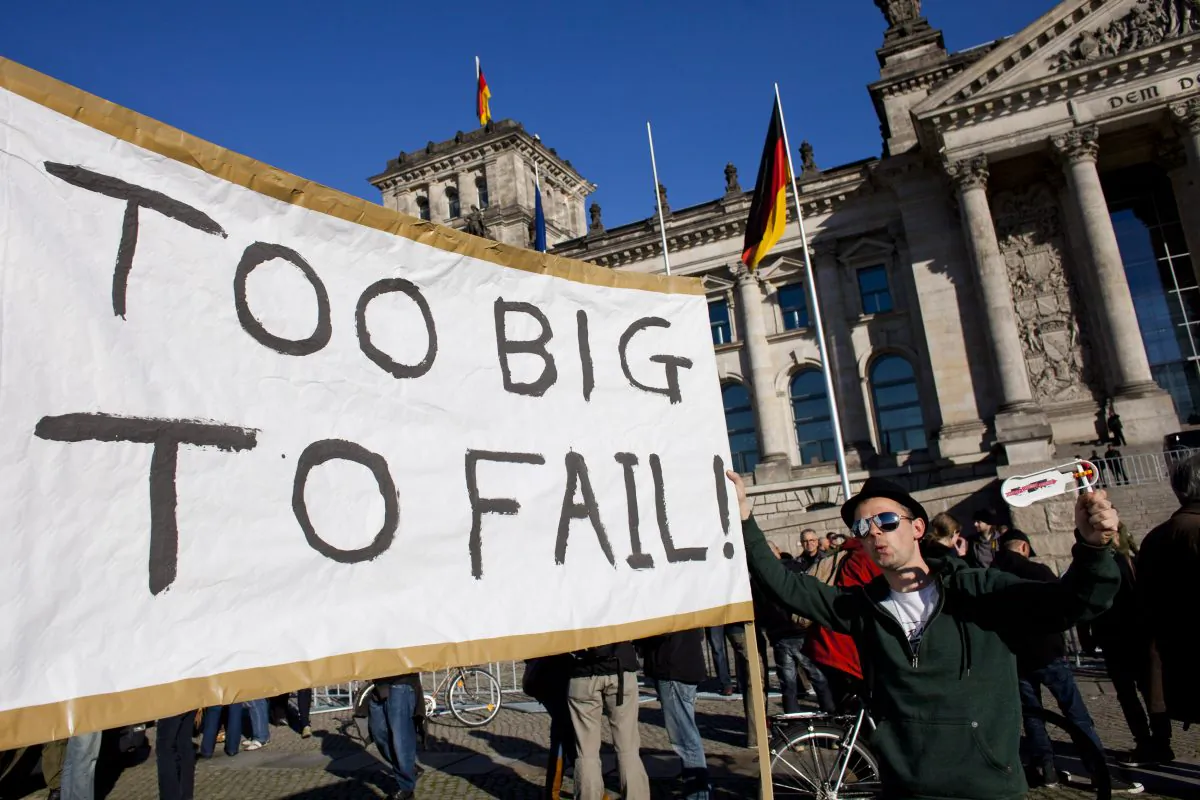 Protesters demonstrating against the influence of bankers and FINANCIERS in front of the Reichstag building in Berlin on Oct. 15, 2011. (Carsten Koall/Getty Images)