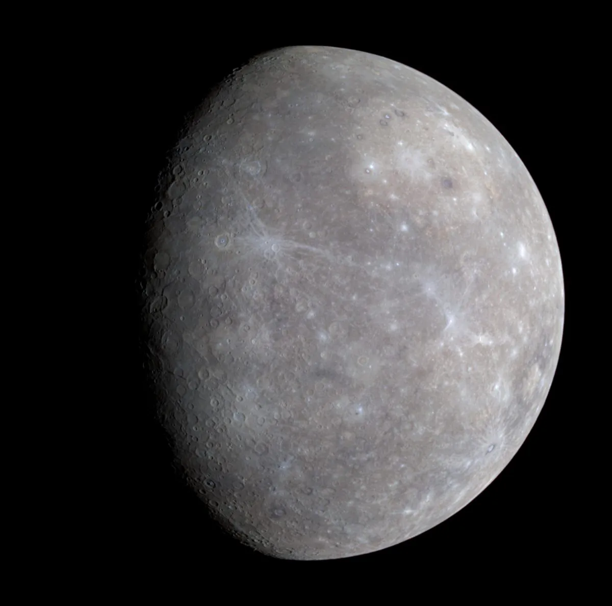 Carbon from passing comets has been building up on Mercury's surface for billions of years and may explain its dark surface, says Peter Schultz. (NASA/Johns Hopkins University Applied Physics Laboratory/Carnegie Institution of Washington via Wikimedia Commons)