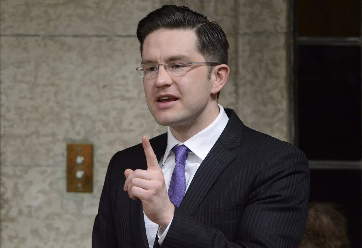 Employment Minister Pierre Poilievre answers a question in the House of Commons on March 23, 2015. In 2011, the Conservative government set April 1, 2015, as the deadline for temporary foreign workers in low-skilled jobs to either become permanent residents or return home. (The Canadian Press/Adrian Wyld)