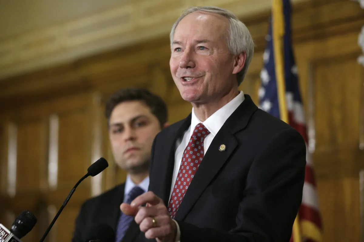 Arkansas Gov. Asa Hutchinson, a Republican, answers reporters' questions at the state Capitol in Little Rock, Ark., on April 1, 2015. (Danny Johnston/AP Photo)