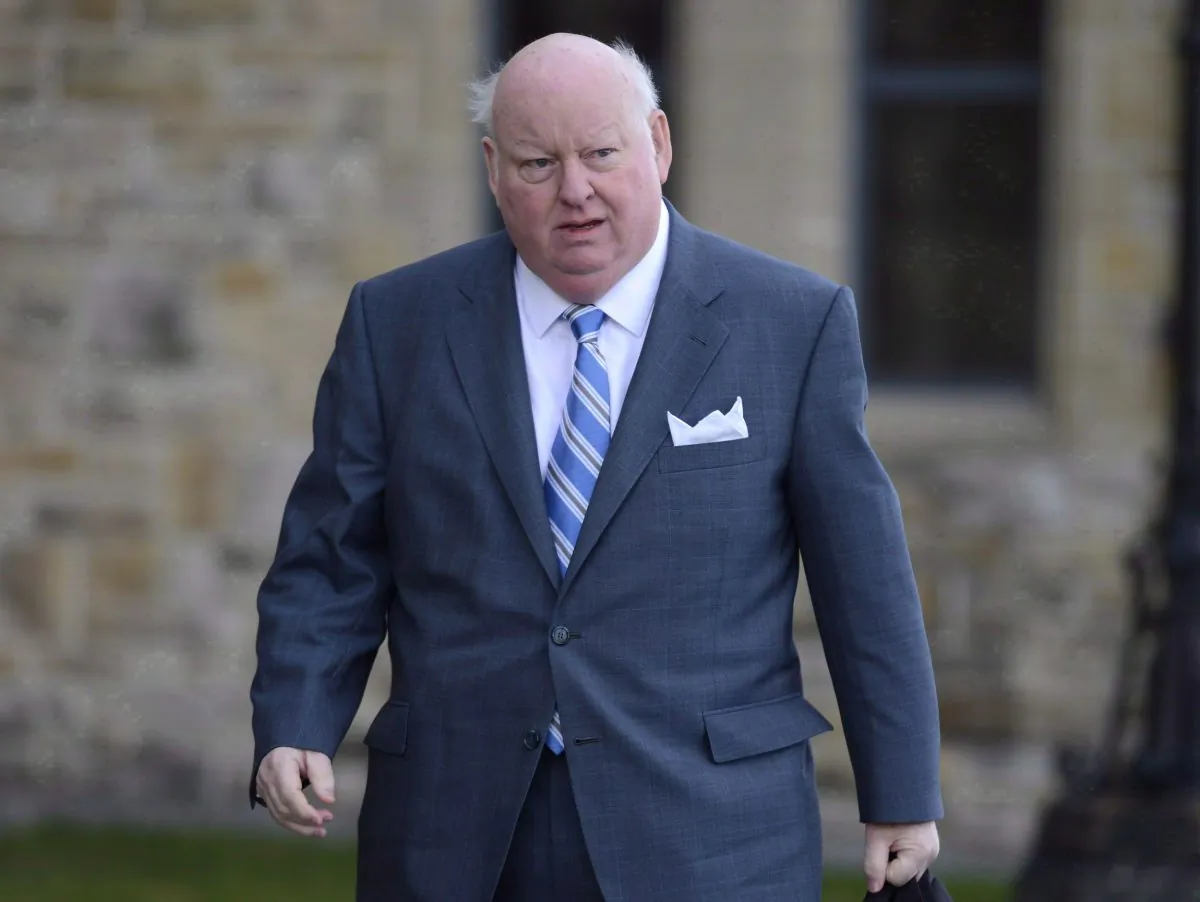 Sen. Mike Duffy arrives at the Senate on Oct. 28, 2013. When lawyers arrive at the Ottawa courthouse for the long-awaited start of Duffy’s trial on April 7, 2015, they’ll be armed with the equivalent of advanced degrees in the rules governing Senate expenses. (The Canadian Press/Adrian Wyld)