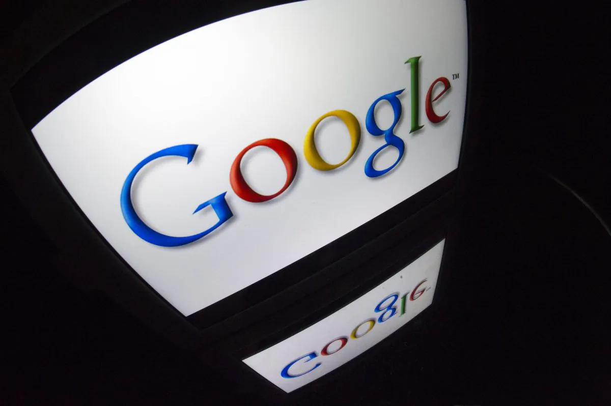 The “Google” logo is seen on a tablet screen on Dec. 4, 2012. Google is banning security certificate issued by a Chinese Internet authority. (Lionel Bonaventure/AFP/Getty Images)