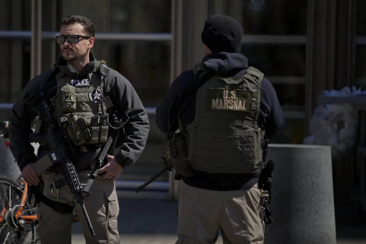 U.S. Marshals stand outside U.S. Federal Court in Brooklyn during the arraignment on terrorism charges of two Queens women, identified as 28-year-old Noelle Velentzas and 31-year-old Asia Siddiqui, as well as American citizen and accused Al Queda member Muhanad Mahmoud al Farekh, 29, April 2, 2015 in New York City. (Victor J. Blue/Getty Images)