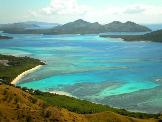 Beach paradise, Fiji Islands, in a stock photo )Shutterstock*)