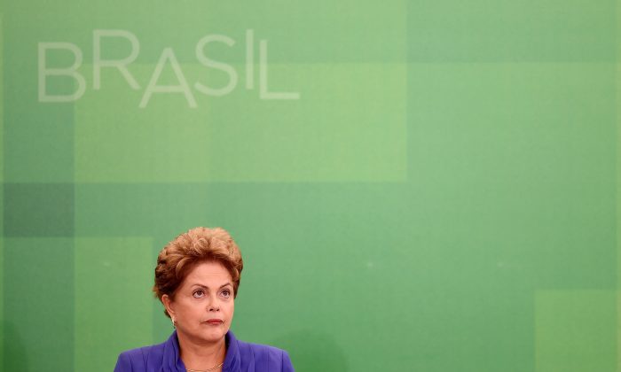 Brazilian President Dilma Rousseff attends a ceremony to announce a package of anti-corruption bills, at the presidential palace in Brasilia, on March 18, 2015. (Evaristo Sa/AFP/Getty Images)