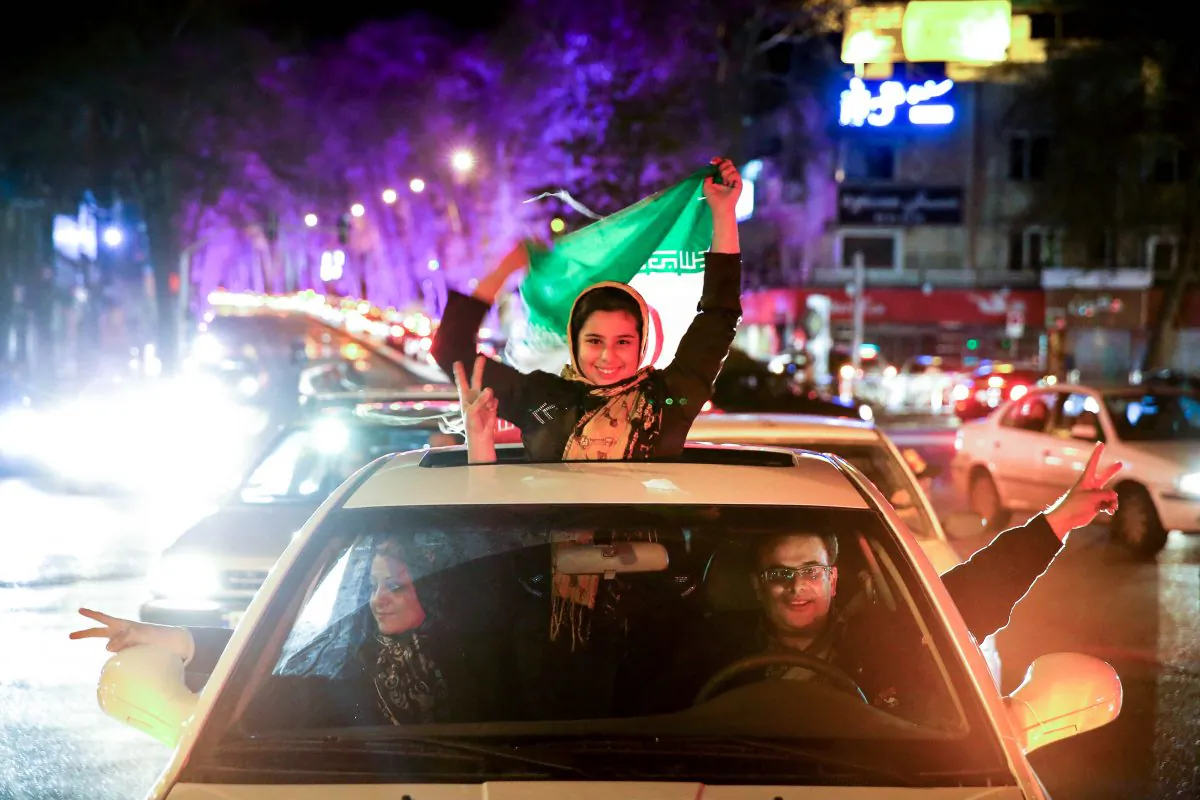 Jubilation in the streets of Tehran after news of the deal which means sanctions will be lifted. (AP Photo/Ebrahim Noroozi)