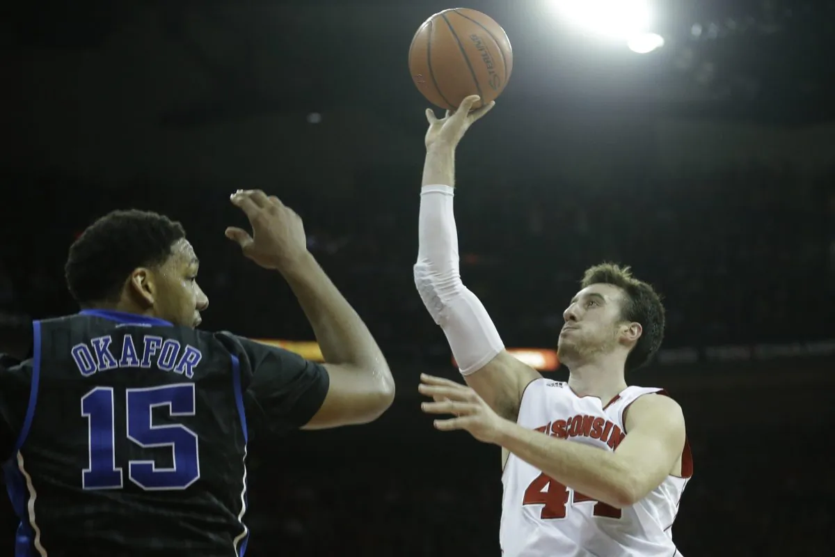 Frank Kaminsky (R) of Wisconsin will have to have a big game against Duke and Jahlil Okafor to bring home the title. (Mike McGinnis/Getty Images) 