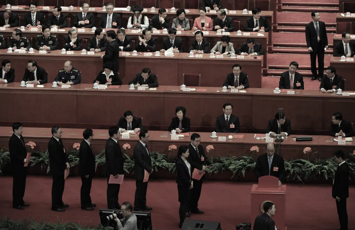 Delegates vote during the election of the new chairman of China during the 12th National People's Congress (NPC) in Beijing on March 14, 2013. (Mark Ralston/AFP/Getty Images)