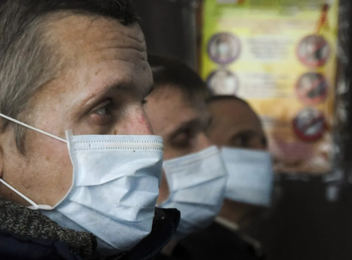 Prisoners of Zhdanivskaya prison listen to a lecture by a social worker in the village of Zhdanivka, eastern Ukraine. Medical supplies have been in short supply, threatening the lives of nearly 400 prisoners who need treatment. The principal scourge: Tuberculosis. The disease spreads prodigiously in jails and develops into hard-to-treat forms unless properly addressed. "TB is so common within the penitentiary system that many inmates don’t see it as a deadly disease _ they see catching TB as a normal part of life in prison," Doctors Without Borders said in a recent situation report. "Some even tell us they don’t care if they die or not." (AP/Mstyslav Chernov)
