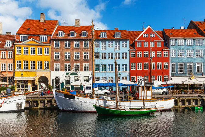 Scenic summer view of color buildings of Nyhavn in Copehnagen via Shutterstock*