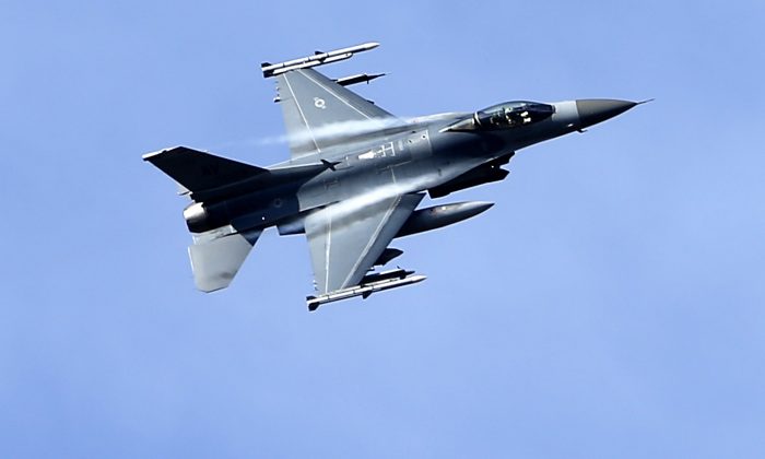 A U.S. military fighter jet participates in a NATO Baltic Air Policing Mission practice mission in the Tapa training area, some 43 miles southwest of Tallinn, Estonia on April 8, 2015. (Mindaugas Kulbis/File Photo/AP)