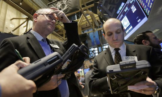 Wall Street Stock Indexes Climb in Morning Trading, GE Gains on Deal News