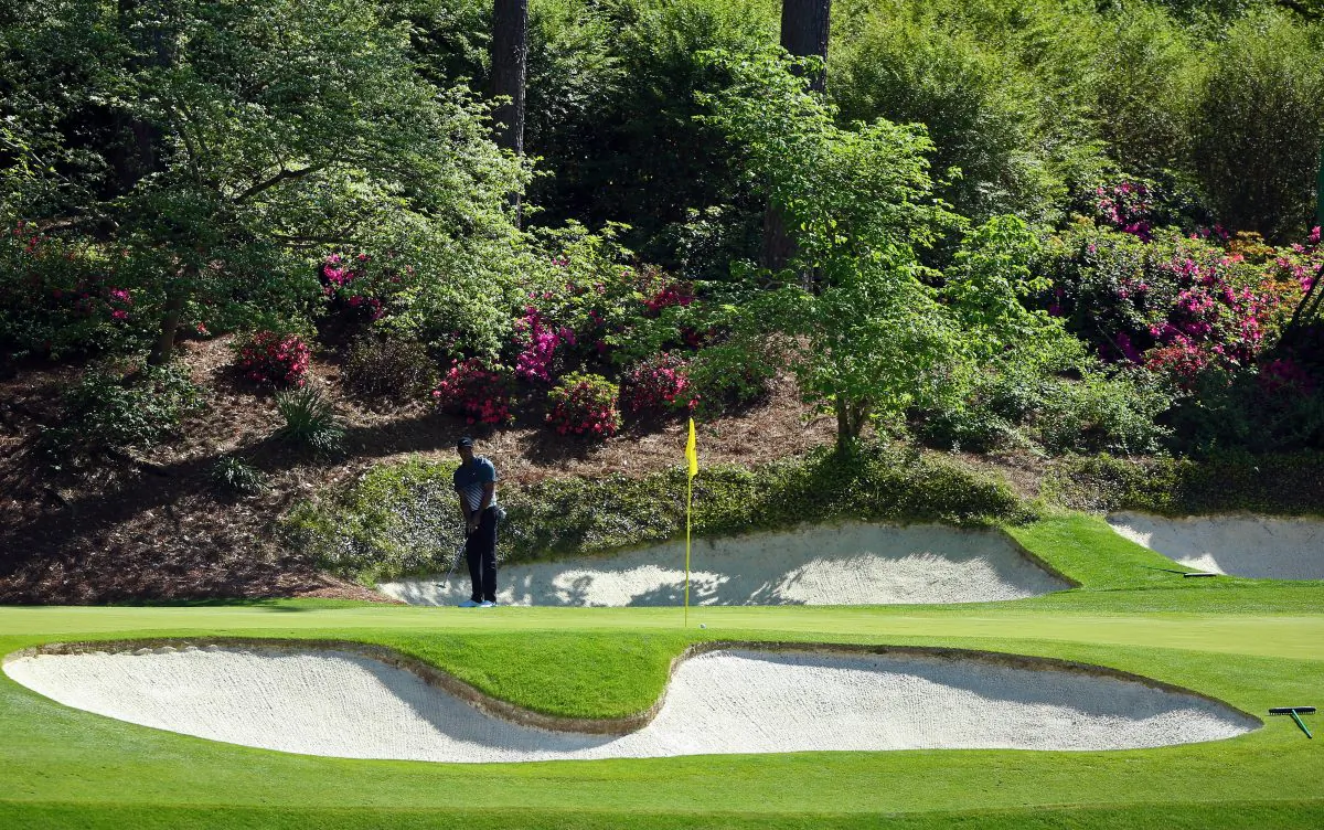 Tiger Woods of the United States hits a shot on the 12th hole during the third round of the 2015 Masters Tournament at Augusta National Golf Club on April 11, 2015 in Augusta, Georgia. (Andrew Redington/Getty Images)
