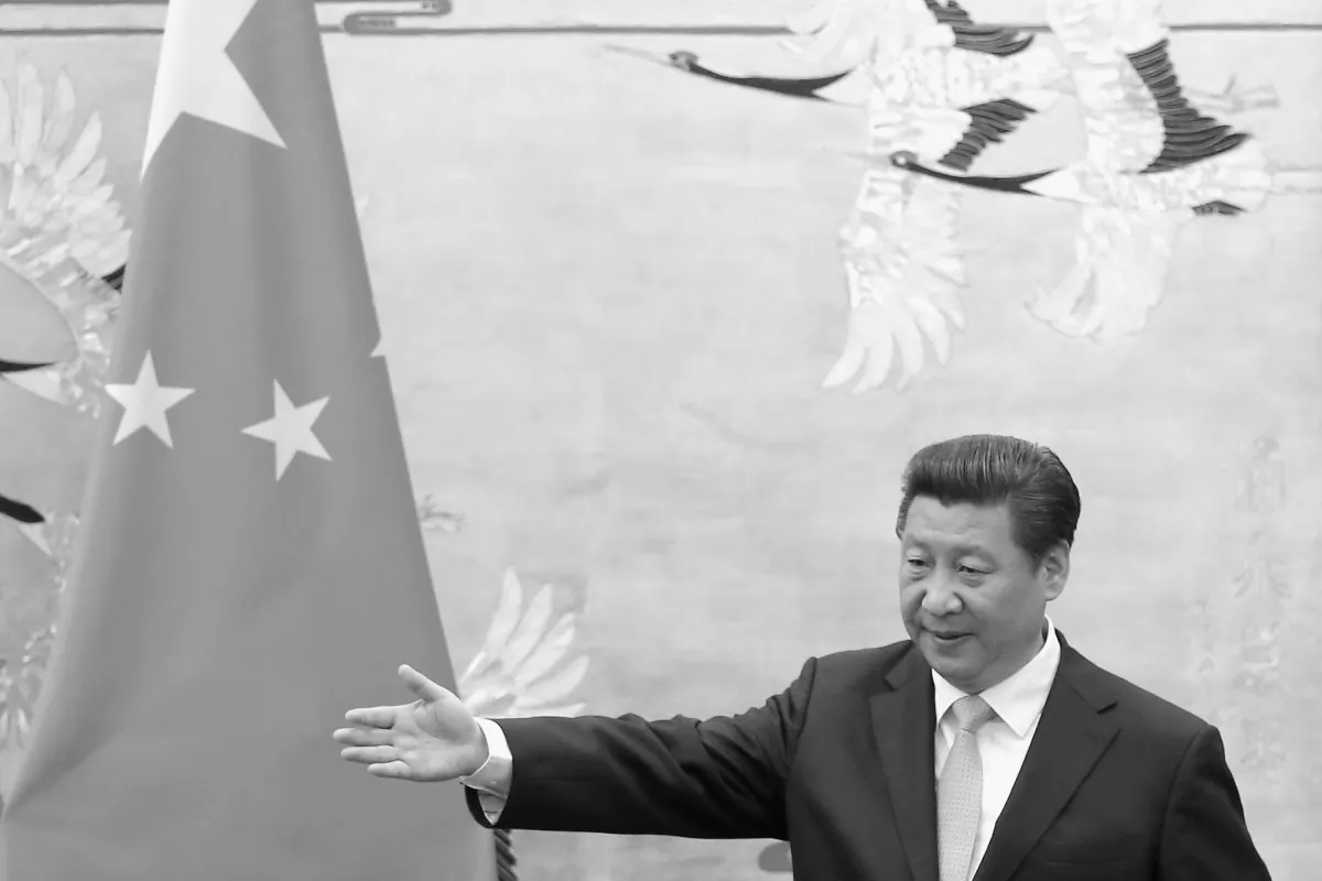 Chinese President Xi Jinping attends a signing ceremony with Ugandan President Yoweri Kaguta Museveni in the Great Hall of the People on March 31, 2015 in Beijing, China. Xi would certainly like to lead the way for China to become world reserve currency, but is it possible? (Feng Li/Getty Images)