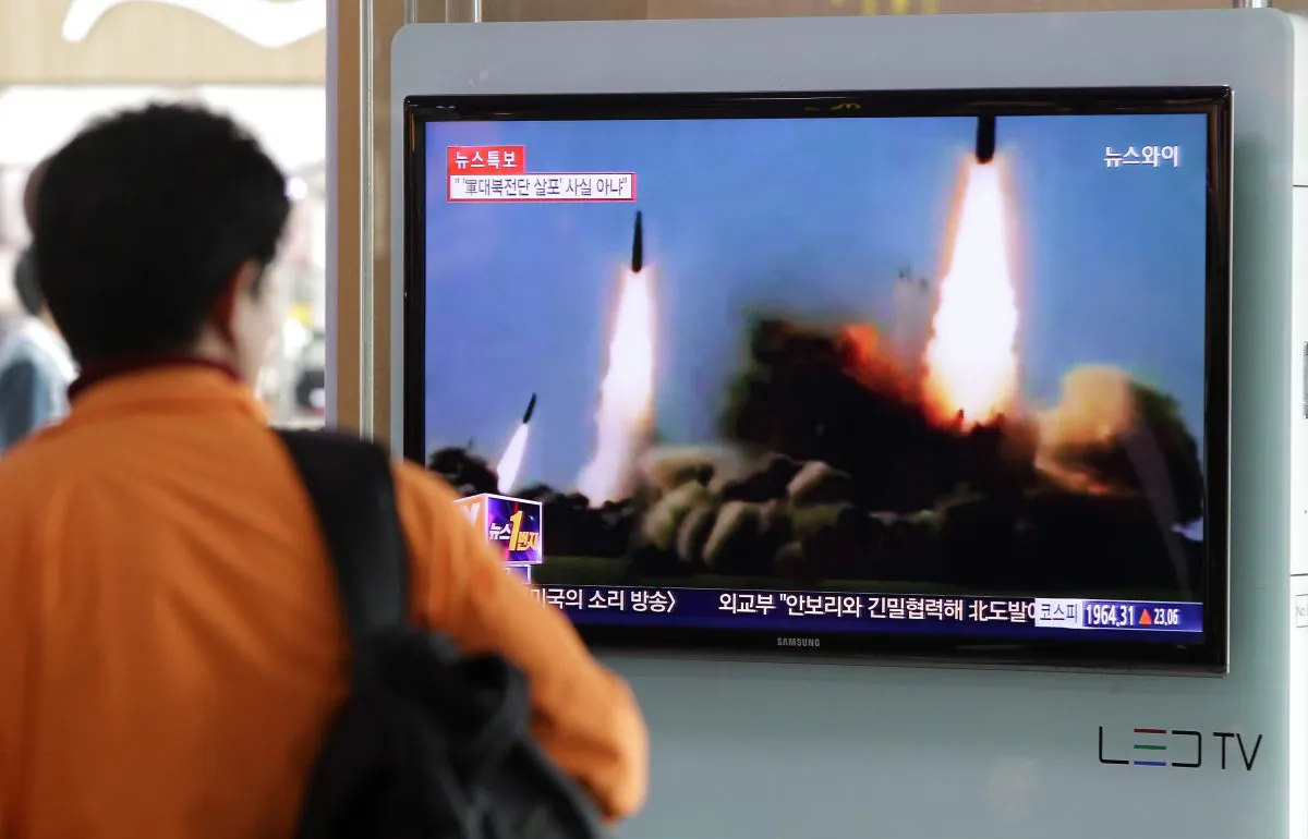 A Man watches a television broadcast in Seoul, South Korea on North Korea's missile launch on March 26, 2014. (Chung Sung-Jun/Getty Images)