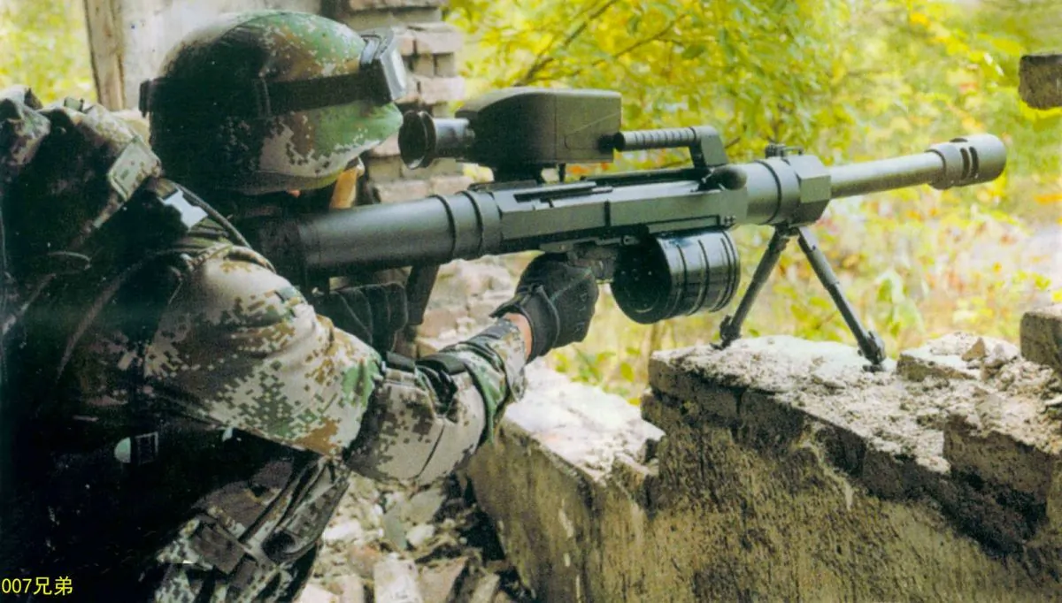 A Chinese soldier uses the LG5 grenade launcher. The Chinese regime will begin exporting the next-generation rifle. (007xiongdi)