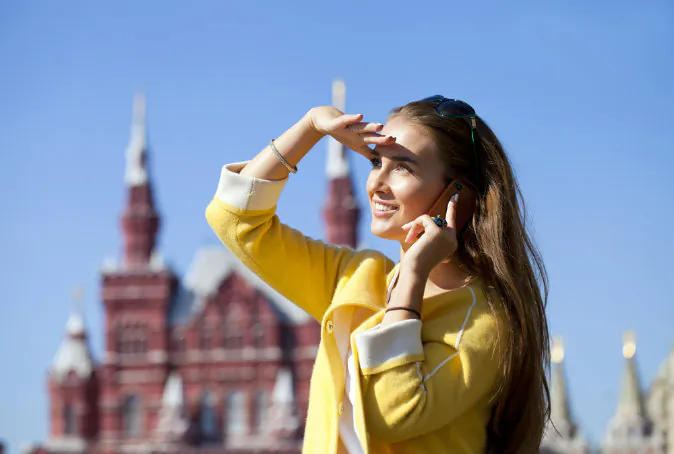 A girl calling by phone via Shuttertock*