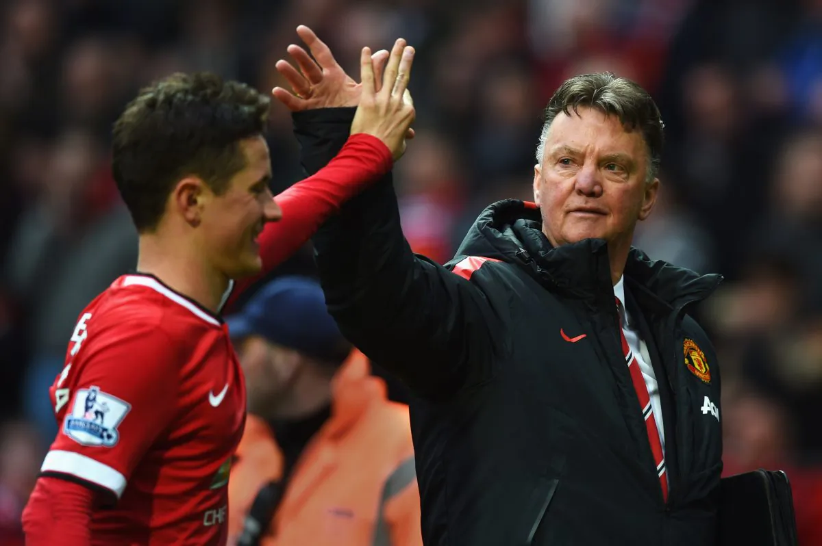 Louis Van Gaal, manager of Manchester United, celebrates victory with his star midfielder Ander Herrera, after the Barclays Premier League match between Manchester United and Manchester City at Old Trafford on April 12th, 2015 in Manchester, England. Herrera has assisted 2, and scored 2 goals in United’s last 3 fixtures. (Michael Regan/Getty Images)