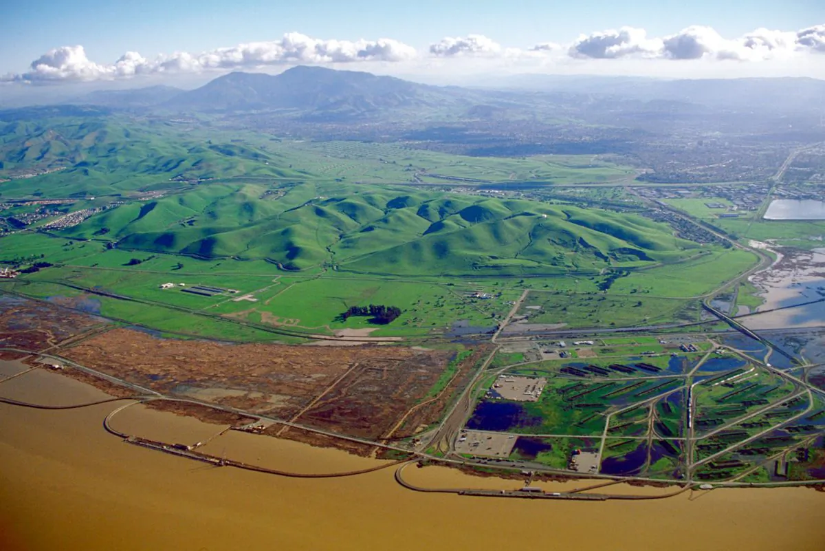 Distant air pollution over San Joaquin Valley. Traditionally we have seen air polution as a local problem. We need to broaden our way of thinking about this problem. (U.S. Army Corps of Engineers)