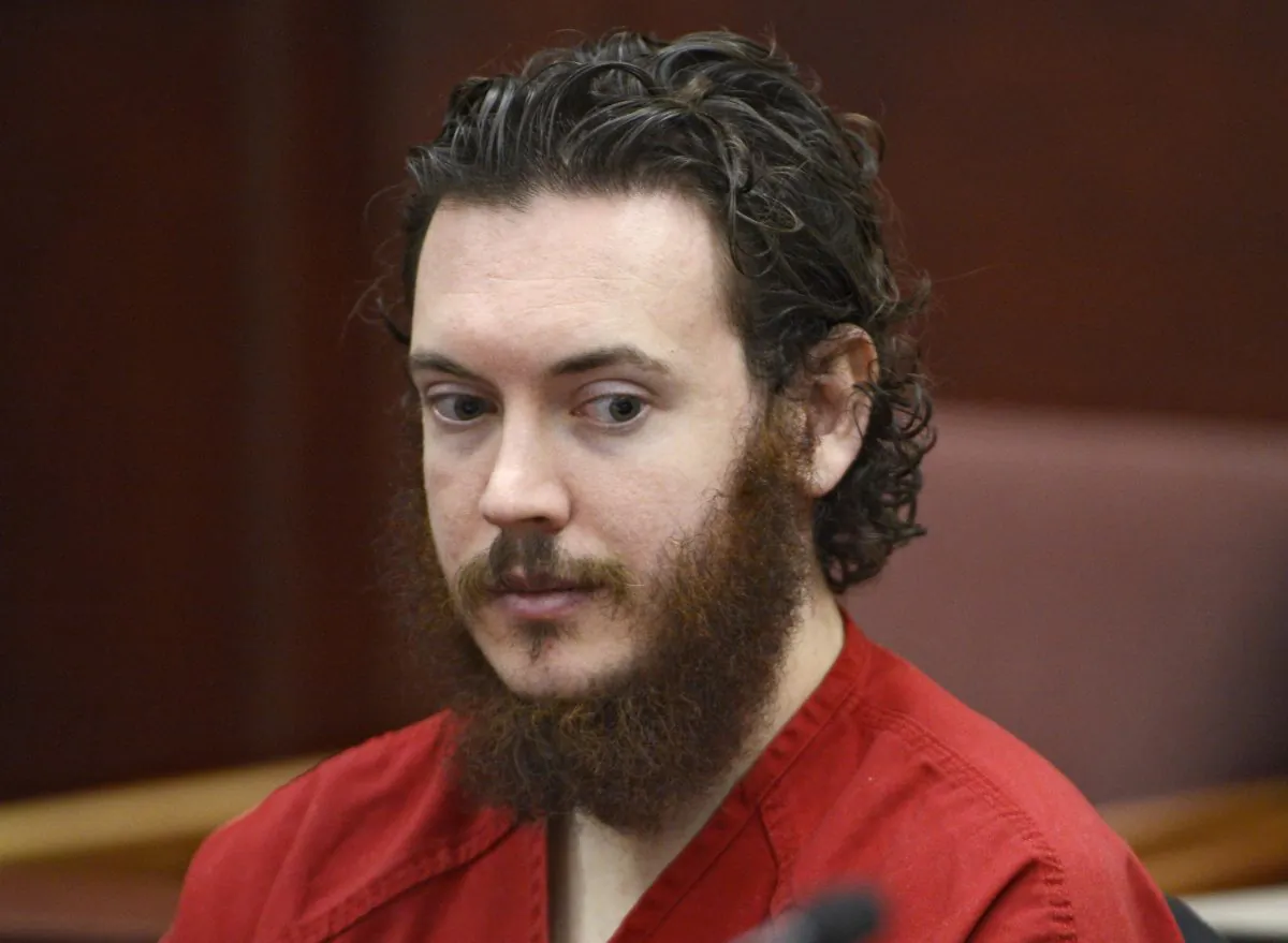 In this June 4, 2013 file photo, Aurora theater shooting suspect James Holmes is seated in court in Centennial, Colo. Jury selection in the Colorado theater shooting case enters its final stage Monday, April 13, 2015 when attorneys begin questioning prospective jurors as a large group. (Andy Cross,/Pool Photo via AP)