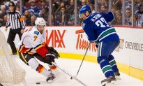 Canucks Hold Slim Edge Over Flames