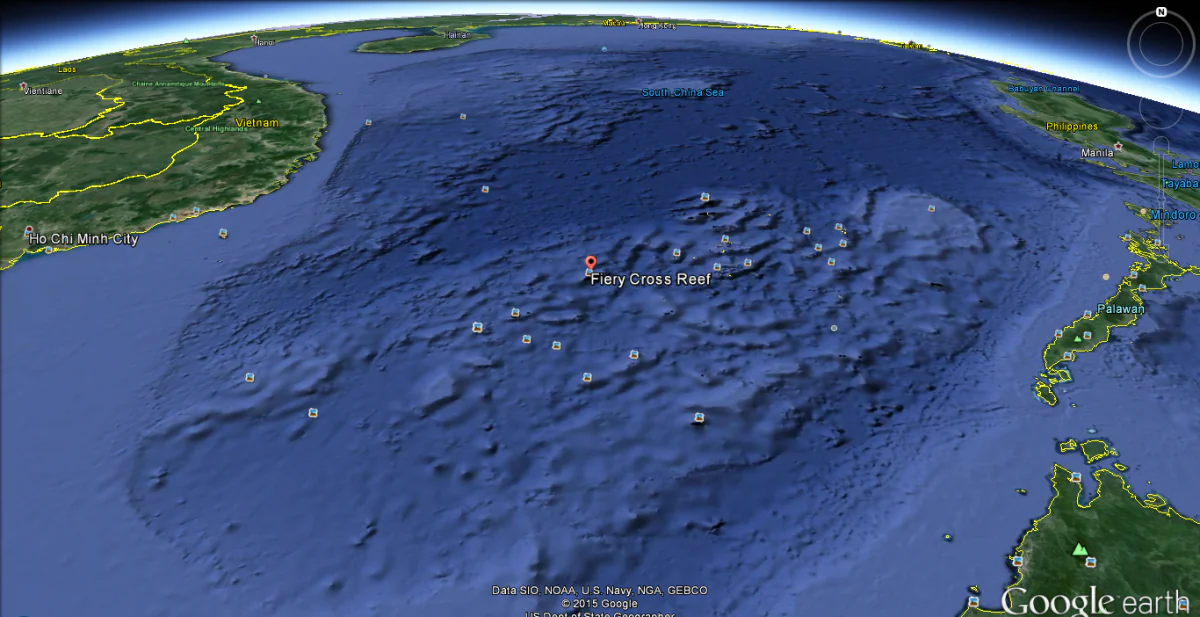 The Fiery Cross Reef is shown amid the Spratly islands in an image from Google Earth. After building an artificial island on the reef, the Chinese regime is now building an airstrip on it. (Google)