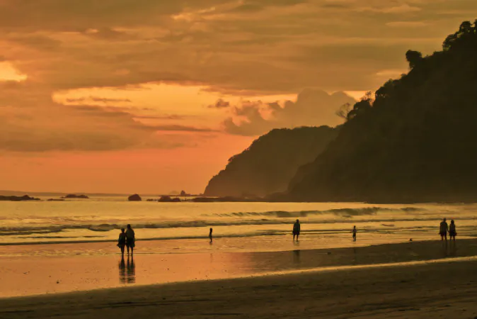  Jaco beach at sunset via Shutterstock*
