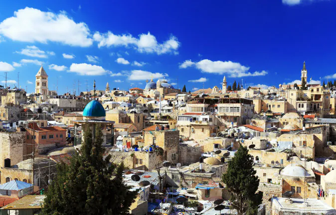 Roofs of Old City with Holy Sepulcher Chirch Dome, Jerusalem, Israel via Shutterstock*