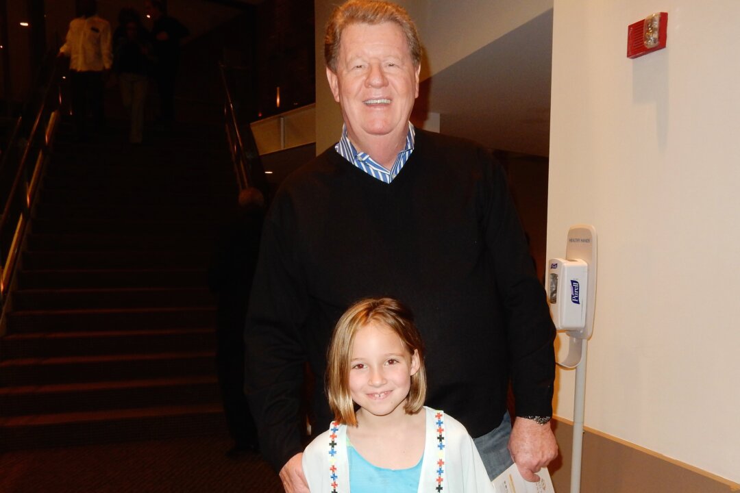 Larry Thornton and his granddaughter at Shen Yun Performing Arts at the Cannon Centre for The Performing Arts on March 13, 2015. (Stacy Chen/Epoch Times)