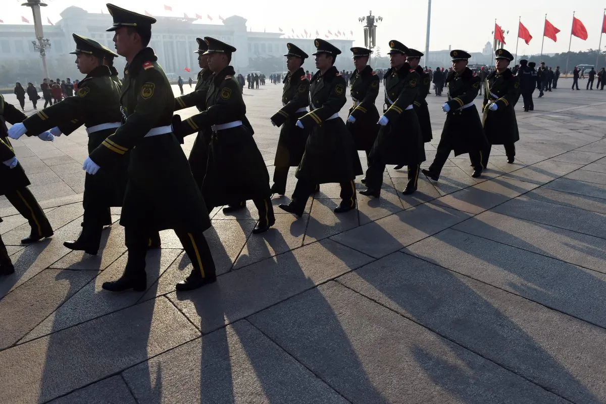 Paramilitary police patrol in Tiananmen Square, in Beijing on March 13, 2015. (Greg Baker/AFP/Getty Images)