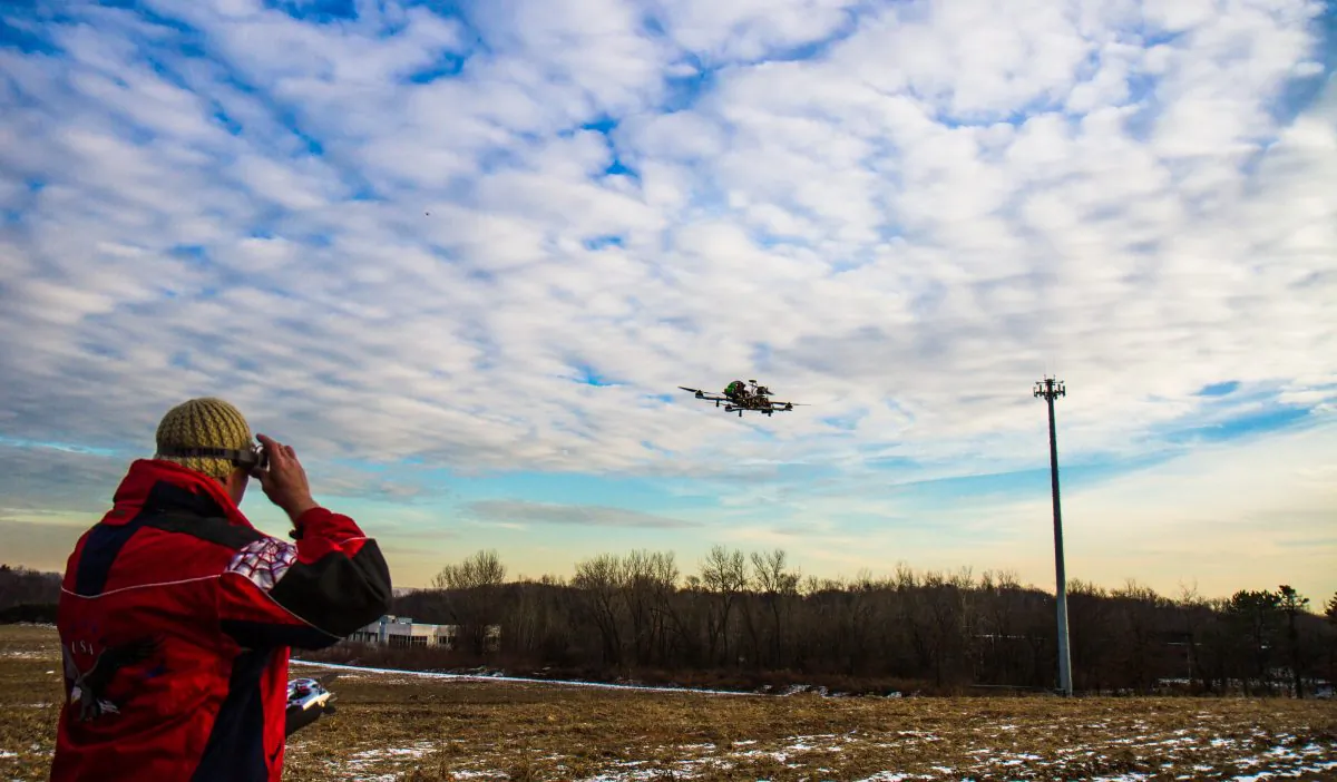 Charles Whiting, a helicopter pilot, flies his drone in Montvale, New Jersey on January 11, 2015. (Amelia Pang/Epoch Times)
