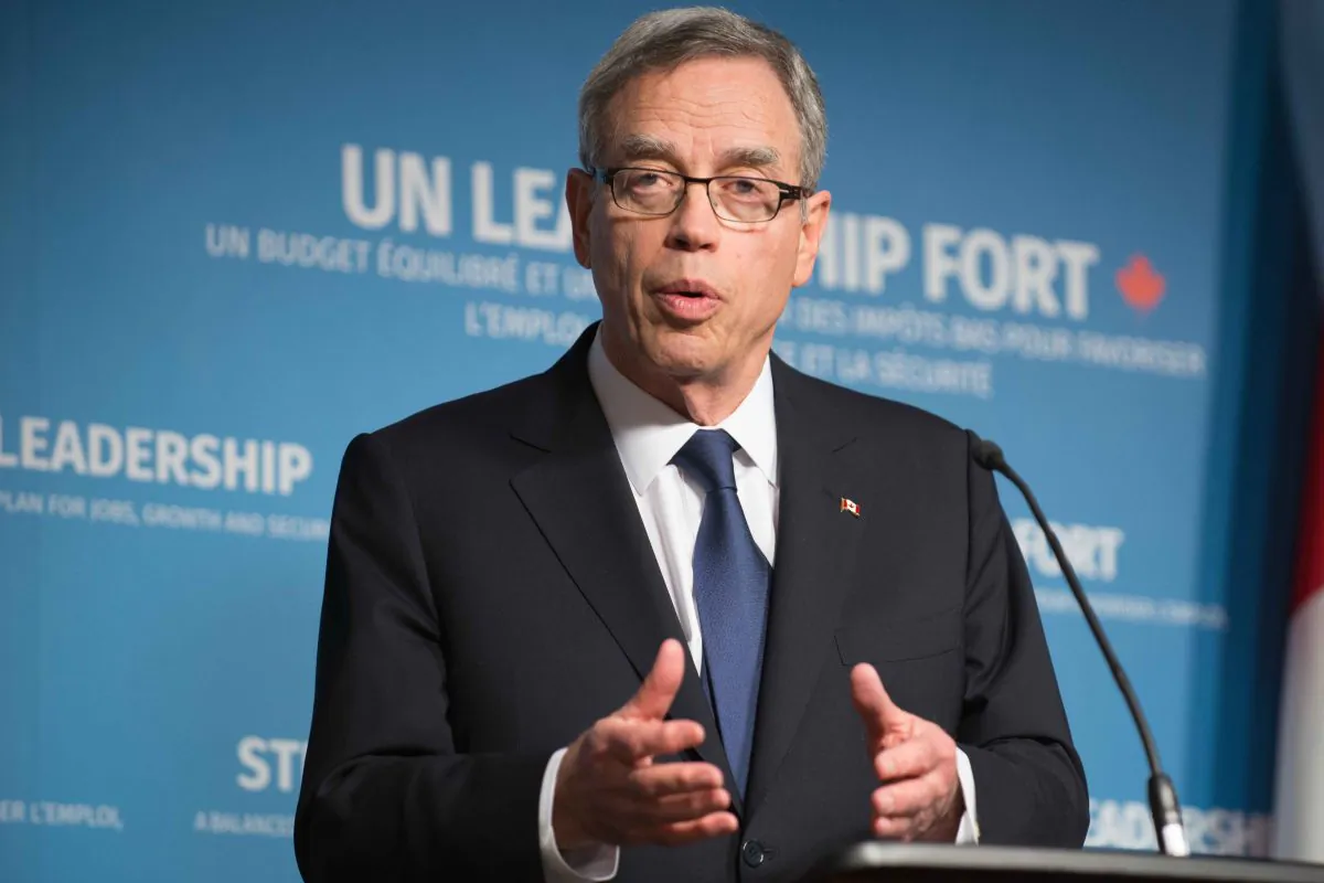 Finance minister Joe Oliver addresses the media in Ottawa on April 21, 2015. (Matthew Little/Epoch Times)