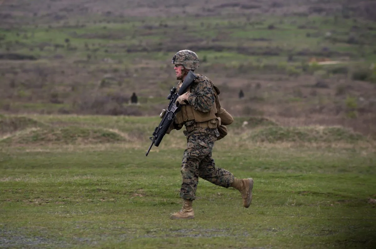 A U.S. Marine trains with the North Atlantic Treaty Organization (NATO) ally Bulgaria on April 14, at the Novo Selo military ground. Several Balkan states are now pushing for NATO membership. (NIKOLAY DOYCHINOV/AFP/Getty Images)