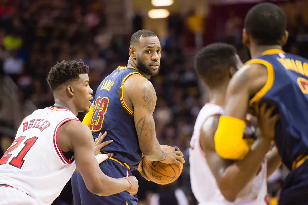 Jimmy Butler (L) and the Chicago Bulls will likely face LeBron James (C) and the Cleveland Cavaliers in a much-anticipated second round matchup. (Jason Miller/Getty Images) 