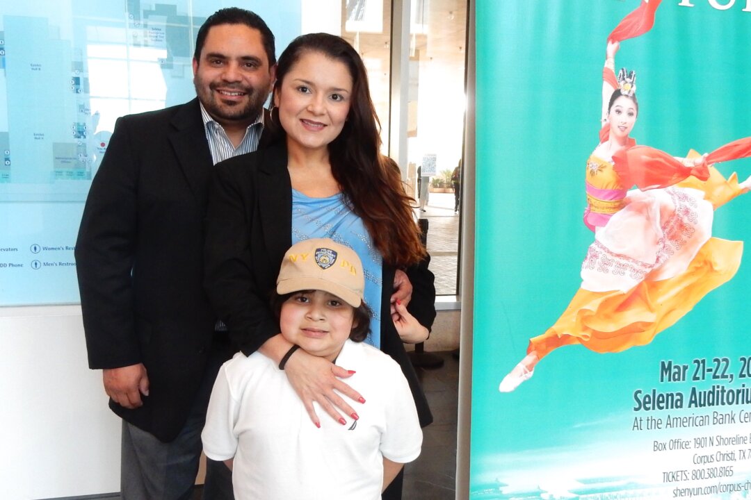 Sada Salazar and Michael Mendoza and their son at Shen Yun Performing Arts at the American Bank Center Selena Auditorium on March 22, 2015. (Stacy Chen/Epoch Times)