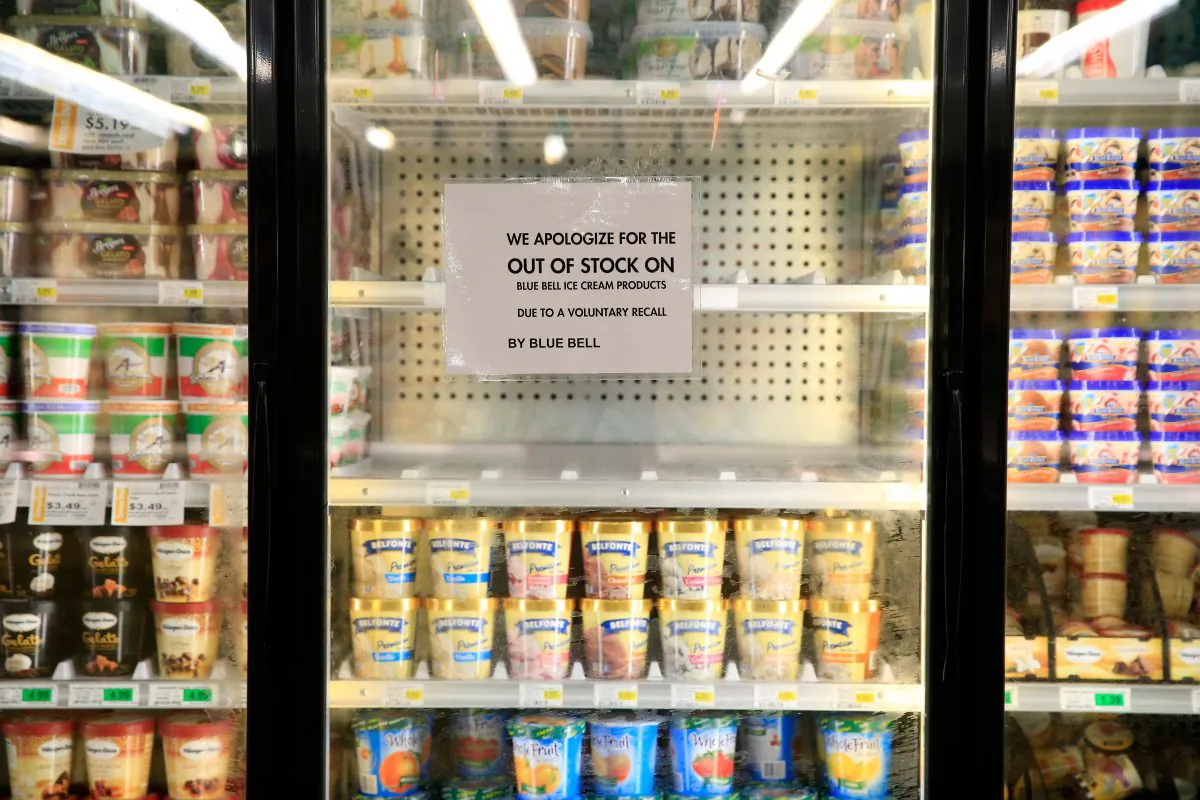 Shelves are bare and signs are posted where Blue Bell products were displayed in a grocery store on April 21, 2015 in Overland Park, Kansas. Blue Bell Creameries recalled all products following a Listeria contamination. (Jamie Squire/Getty Images)