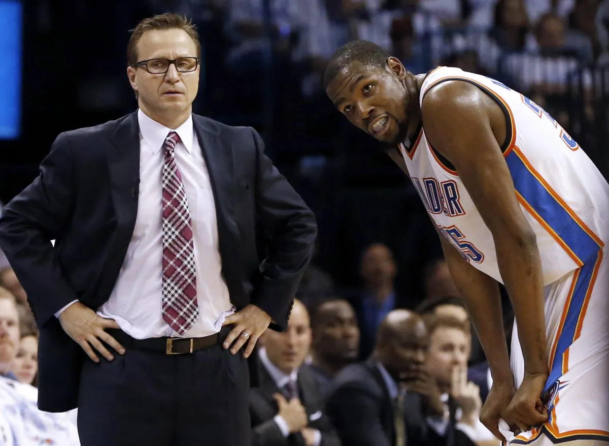 Former Oklahoma City Thunder coach Scott Brooks (L) and forward Kevin Durant made the playoffs five straight seasons but were unable to bring home a title together. (AP Photo/Sue Ogrocki)