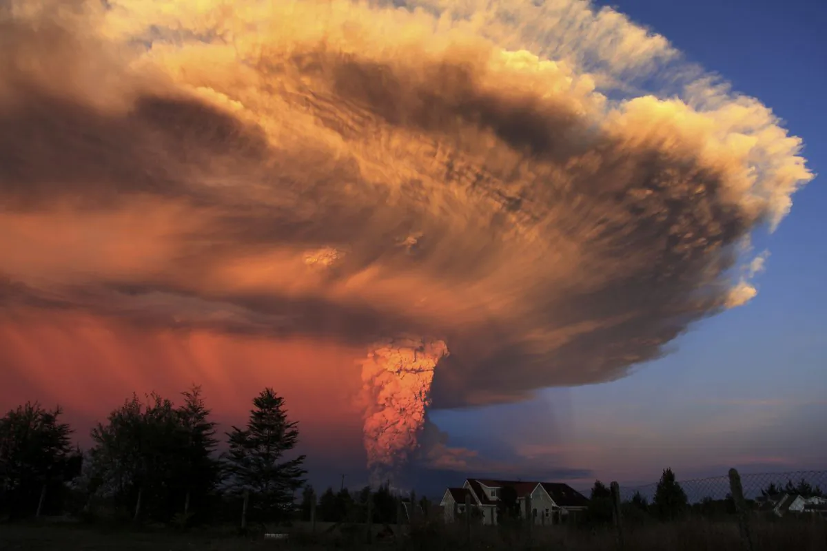 The Calbuco volcano erupts near Puerto Varas, Chile, Wednesday, April 22, 2015. The Calbuco volcano erupted Wednesday for the first time in more than 42 years, billowing a huge ash cloud over a sparsely populated, mountainous area in southern Chile. Authorities ordered the evacuation of the 1,500 inhabitants of the nearby town of Ensenada, along with residents of two smaller communities.(AP Photo/Diego Main/Aton Chile)