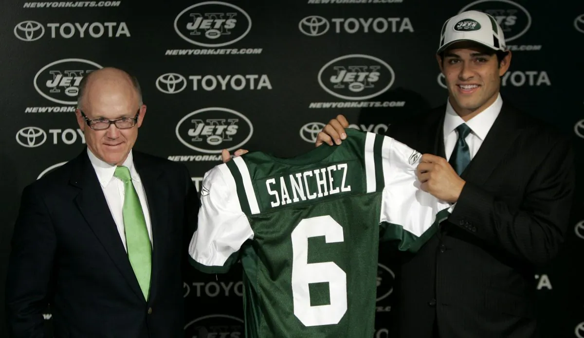 New York Jets and owner Woddy Johnson (L) took Mark Sanchez fifth overall in the 2009 NFL Draft. (AP Photo/Rich Schultz)