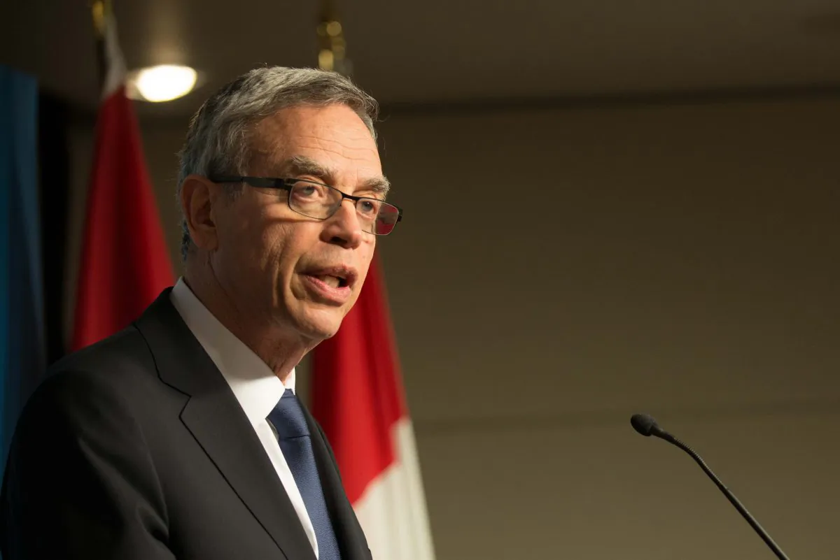 Finance Minister Joe Oliver said on Tuesday that he could not discuss the details of legislation signalled in the budget that would compel some companies to disclose cyber breaches to the federal government. (Matthew Little/Epoch Times)