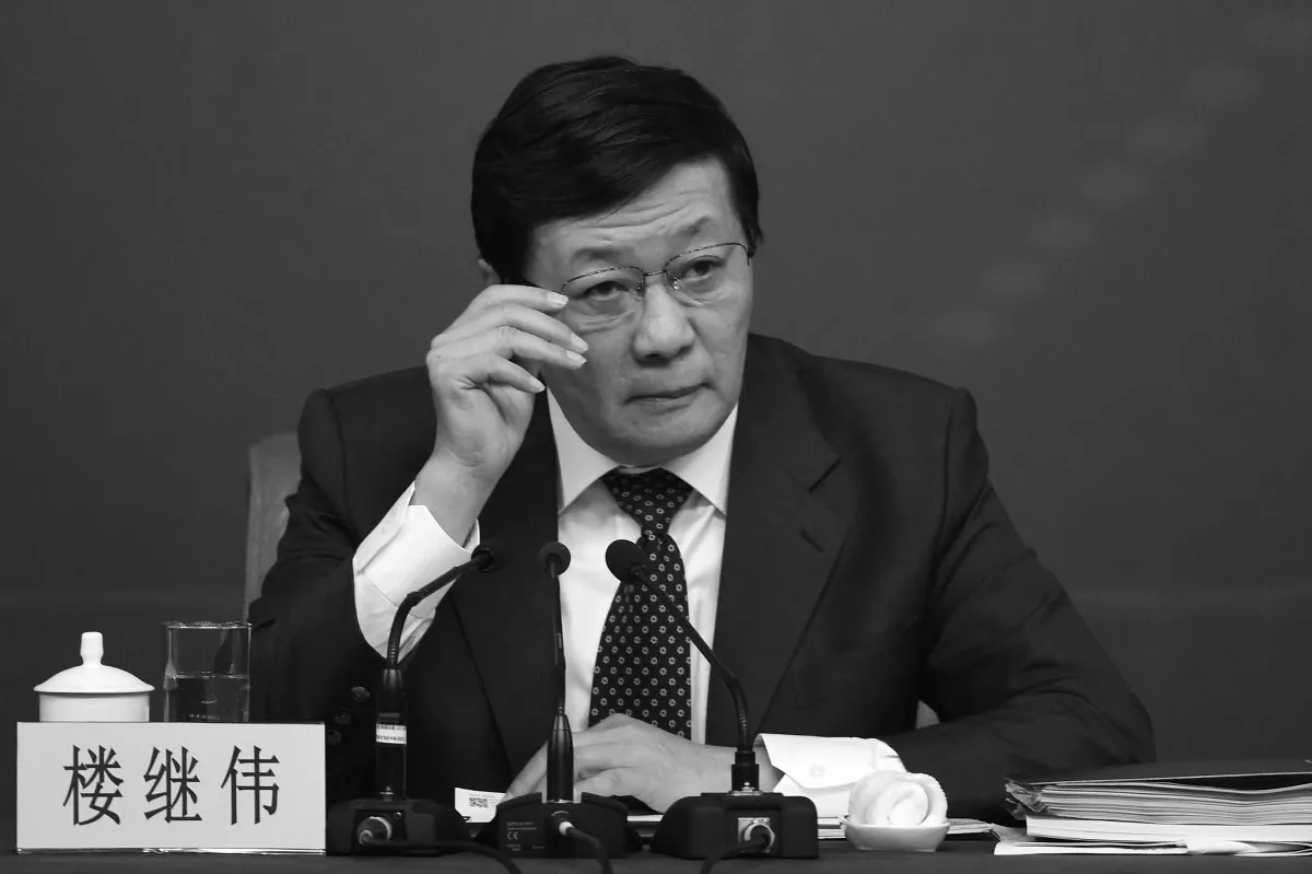 Chinese Finance Minister Lou Jiwei attends a press conference in Beijing on March 5, 2015. Lou warned that China could be headed toward “middle-income trap.” (Wang Zhao/AFP/Getty Images)