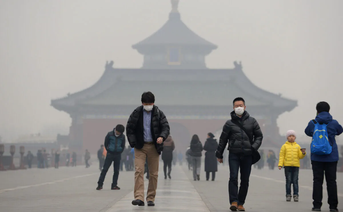 Temple of Heaven in haze-covered Beijing on Feb. 24, 2014. (STR/AFP/Getty Images)