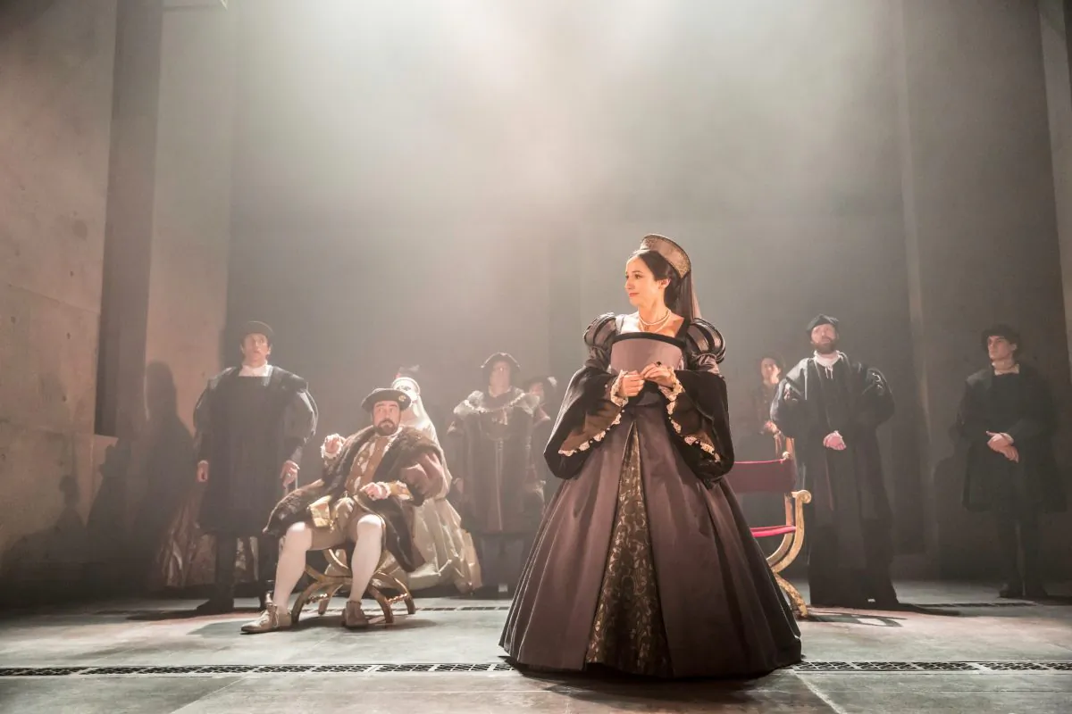 (L–R) Thomas Cromwell (Ben Miles), King Henry VIII (Nathaniel Parker) and Anne Boleyn (Lydia Leonard) are the three characters in the two-part theatrical staging of Hilary Mantel’s “Wolf Hall.” (Johan Persson)