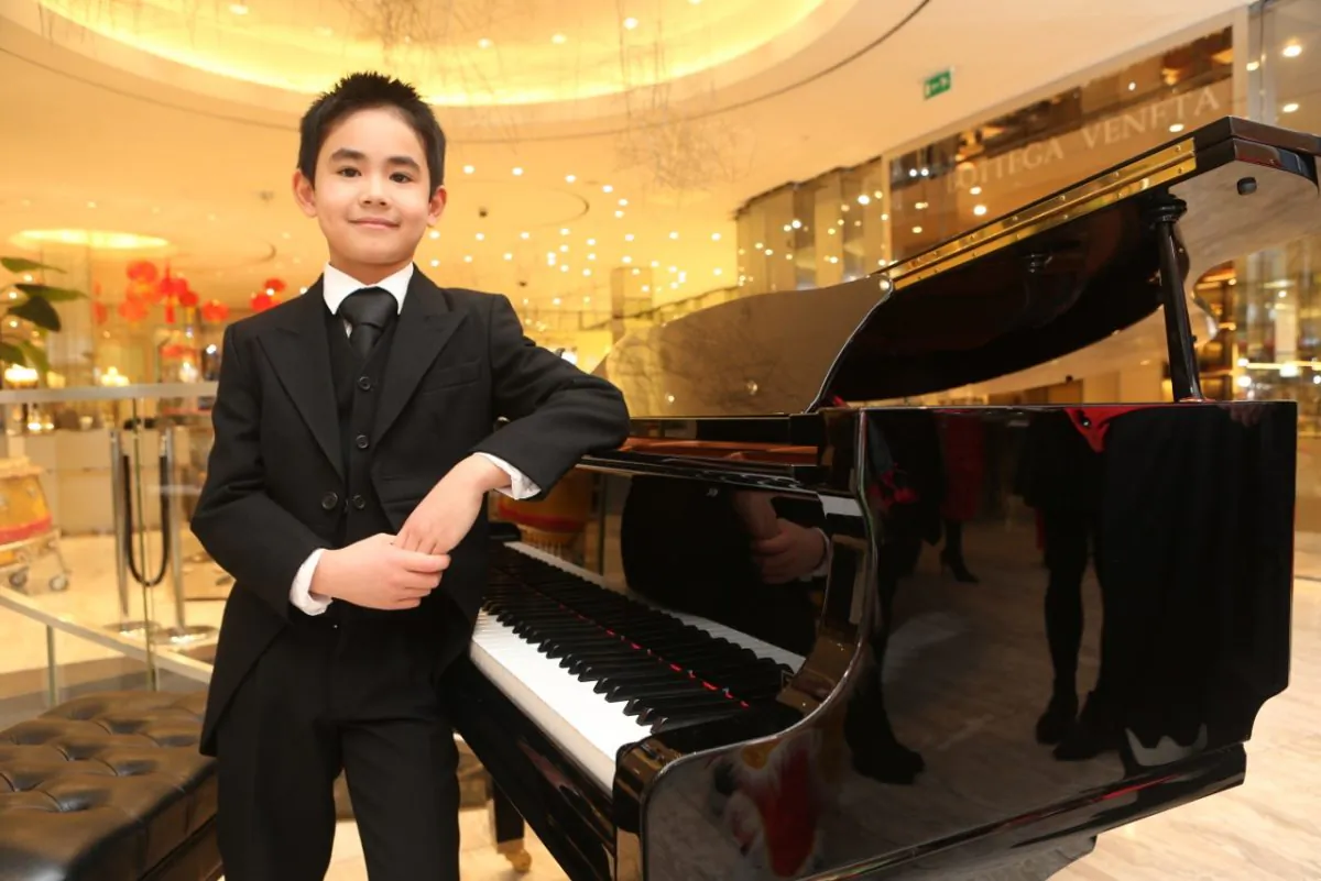 Joe O’Grady, 9-year-old pianist studying at the Royal Irish Academy of Music with Prof. John O’Conor and Prof. Réamonn Keary. O’Grady started playing the piano at age 3 and his first piano competition when was 5. He was selected as on of ten top talented artists to perform at the Royal Irish Academy of Music Higher Achiever Awards 2013 Gala Concerts. He has also been a first prizewinner in the Under-9 and -11 Piano Solo at the Irish national competition Feis Ceoil. He made his first public broadcast appearance on Irish national television’s “Kindspeak” and “Beo Show.”