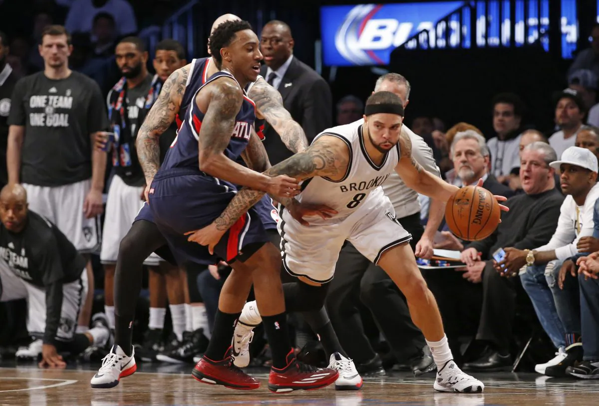 Brooklyn Nets guard Deron Williams (R) scored 35 points against the Atlanta Hawks and guard Jeff Teague (L) to tie the series at two. (AP Photo/Kathy Willens)