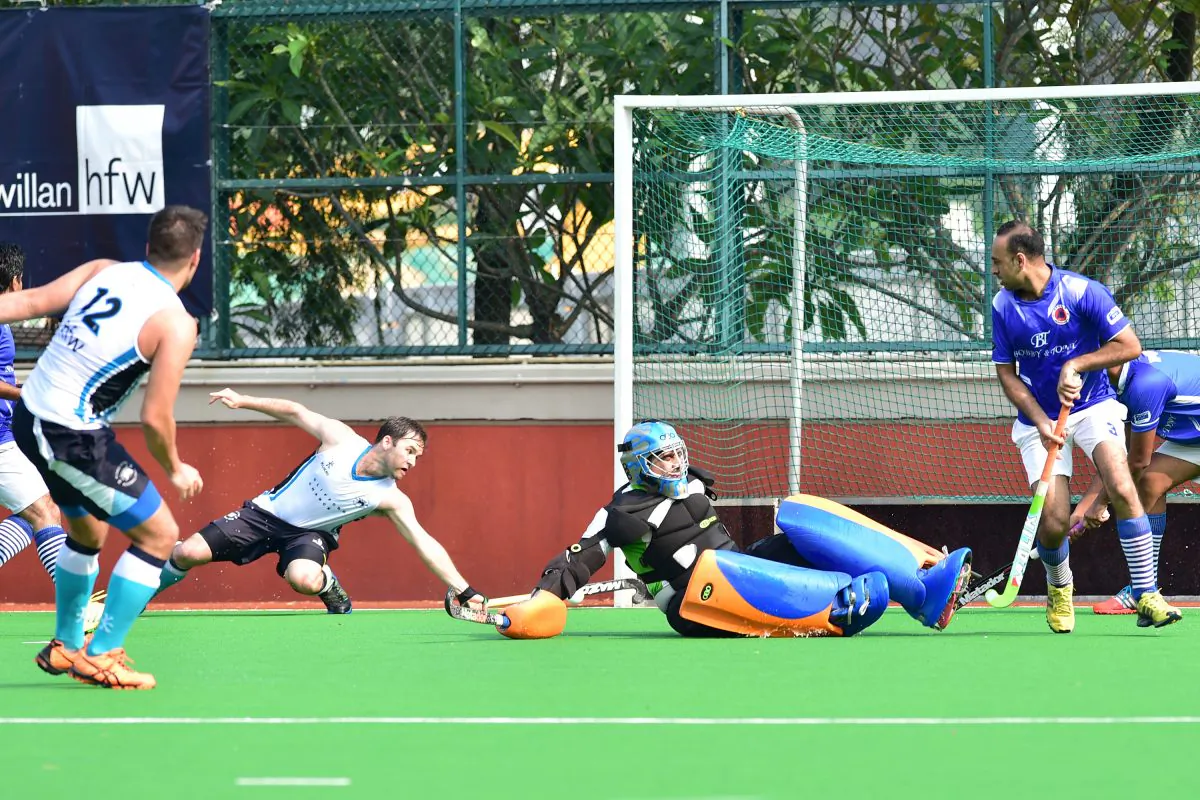 Punjab-A goalie makes a great save during their Holland Cup Semi-final match against HKFC-A at Hong Kong Football Club on Sunday April 26. Punjab-A won the game 8-5 to move into the final against SSSC-A on May 10, 2015. (Bill Cox/Epoch Times)