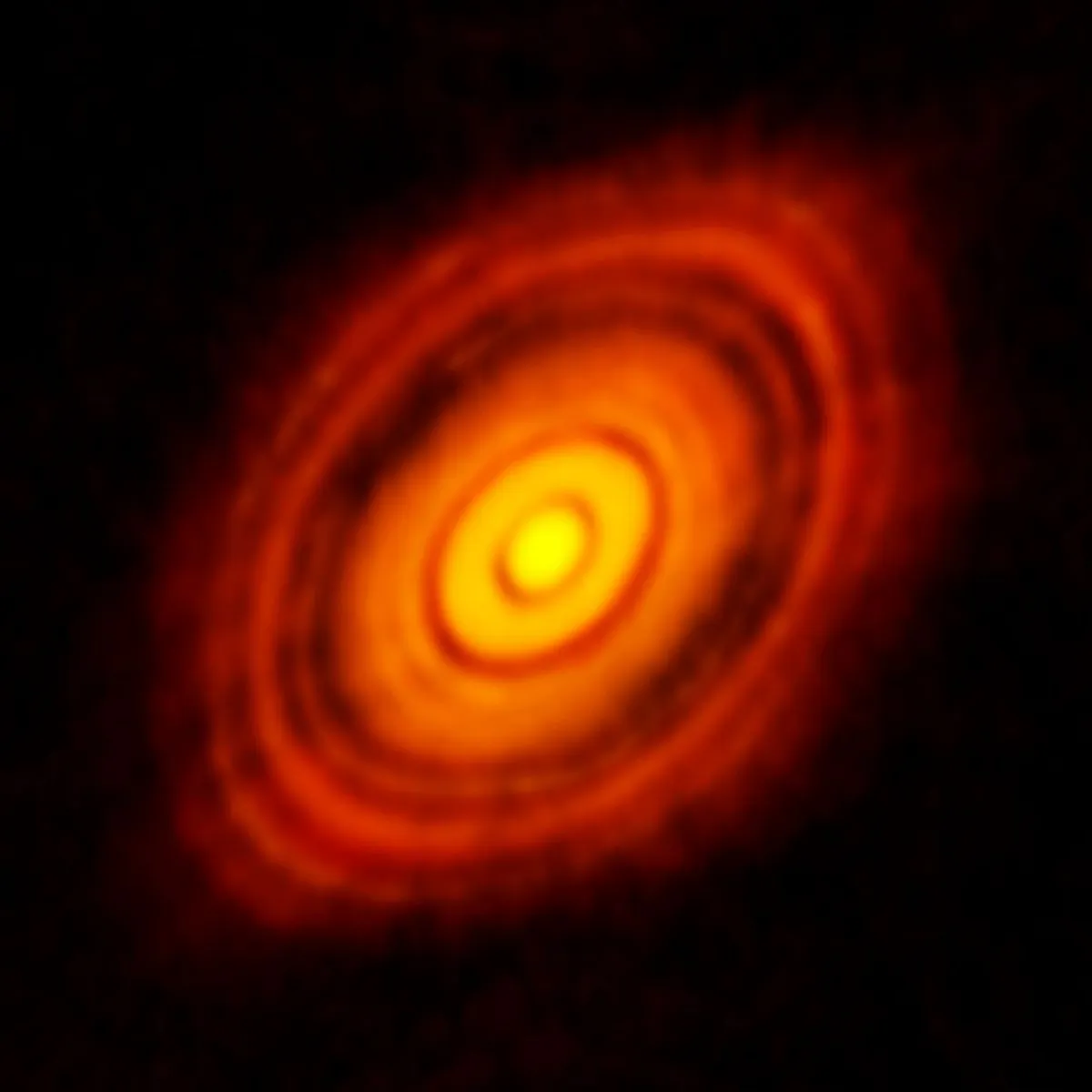 This image sparked scientific debate when it was released last year, with researchers arguing over whether newly forming planets were responsible for gaps in the dust and gas swirling around the young star. Now astrophysicists say they have proof. (ALMA [ESO/NAOJ/NRAO])