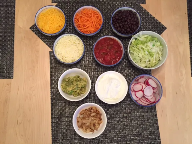 It is easy to switch out some of the classic ingredients of taco toppings with fresh and less processed foods (photo by LivligaHome).