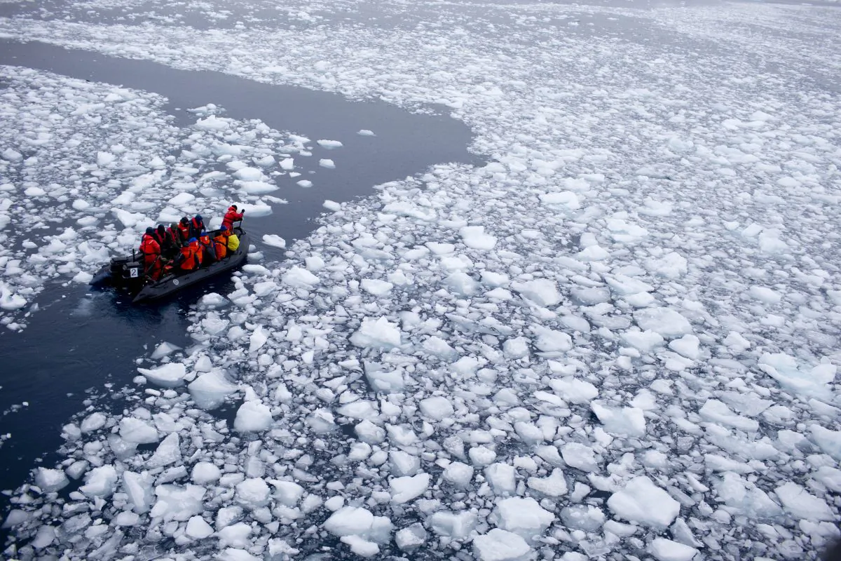 A research team conduct surveys around Antarctica on Jan. 22, 2015. As the ice sheets slowly thaw, water pours into the sea, 130 billion tons of ice per year for the past decade, according to NASA satellite calculations. (AP Photo/Natacha Pisarenko)